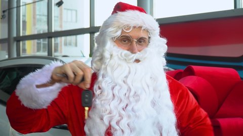 Santa Claus at a car dealership. Santa buys a gift car