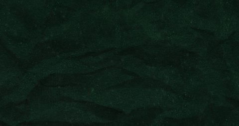 Animation of crumpled pattern moving in hypnotic motion in seamless loop on dark green background. Colour and movement concept digitally generated image. Vídeo Stock