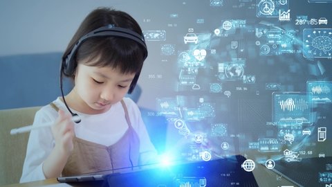 Asian little girl taking online class. Education technology. EdTech.