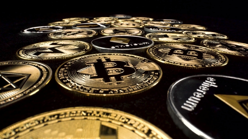 macro view rising over gold and silver cryptocurrency coins on black background, 4k blockchain altcoin investment Royalty-Free Stock Footage #1058137633