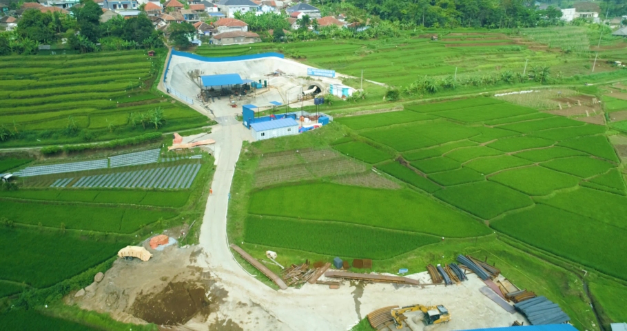 Scenic aerial view of high speed train tunnel 10 inlet construction project  near cimeta bridge and cipularang toll road, padalarang bandung, indonesia