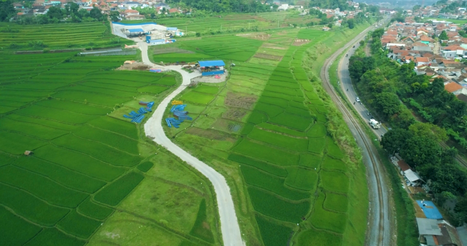 Scenic aerial view of high speed train tunnel 10 inlet construction project  near cimeta bridge and cipularang toll road, padalarang bandung, indonesia