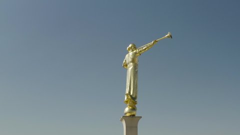 Los Angeles , CA / United States - 08 17 2020: Flight around the Angel Moroni statue on top of the Mormon Temple in Los Angeles California