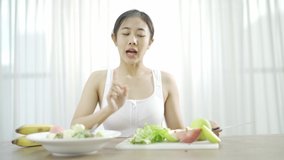 Healthy women in Asian beauty are live streaming. Teach content about eating healthy fruit. Inside your house Healthy weight loss ideas