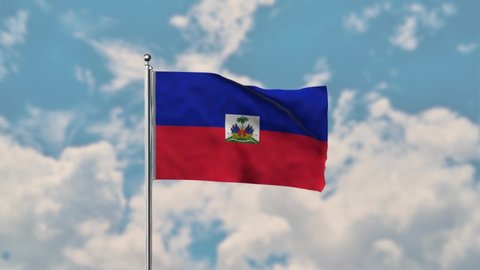 Haiti flag waving in the blue sky realistic 4k Video.