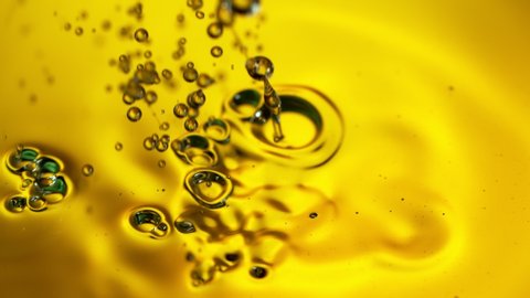 Super Slow Motion Shot of Pouring Golden Oil Liquid at 1000fps.