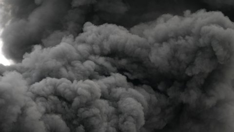 Black, dense and thick smoke column, highly polluting from a fire caused by a disaster, terrorist attack, bomb, generates an atmosphere of horror, pollution, impossible to control 4k at 59.94 frames