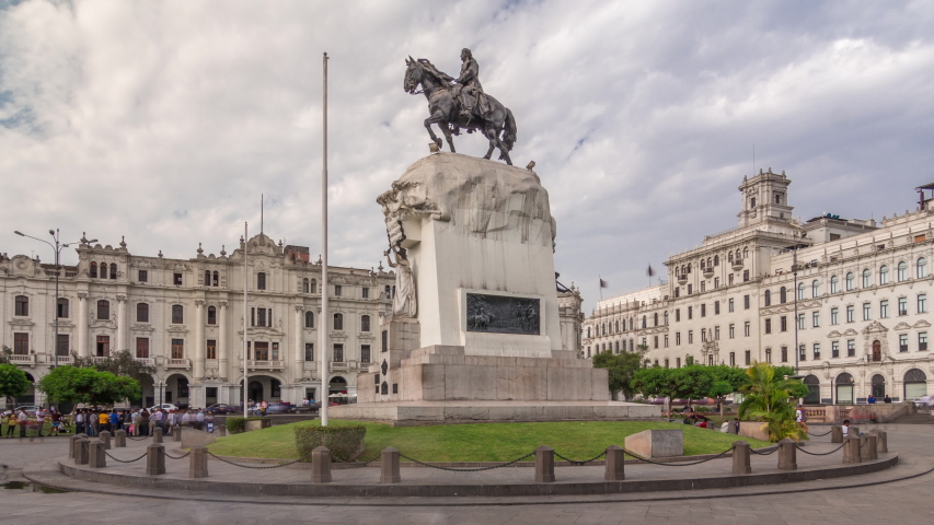 Monument to Jose de San Martin on the Plaza San Martin timelapse hyperlapse in Lima, Peru. Cloudy sky and historic buildings on a background Royalty-Free Stock Footage #1058174311