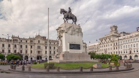 Monument to Jose de San Martin on the Plaza San Martin timelapse hyperlapse in Lima, Peru. Cloudy sky and historic buildings on a background