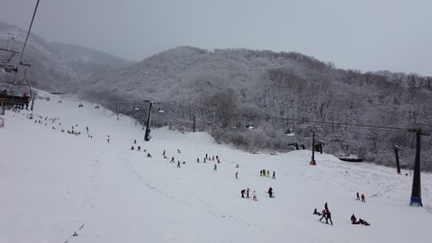 Hakuba, Japan - January 1,2020 : Many people enjoy skiing at Hakuba Goryu Snow Resort in Hakuba, Japan on January 1,2020.