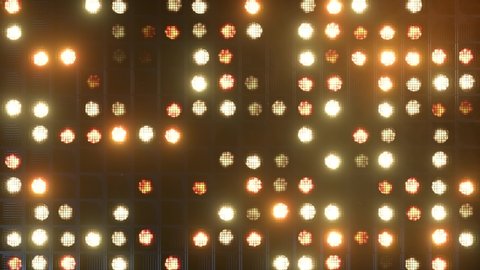 Flashing wall lights. Flashing lights Lanterns for clubs and discos. Matrix beam headlights. Nightclub halogen lamp. Seamless loop 3d render. Warm light