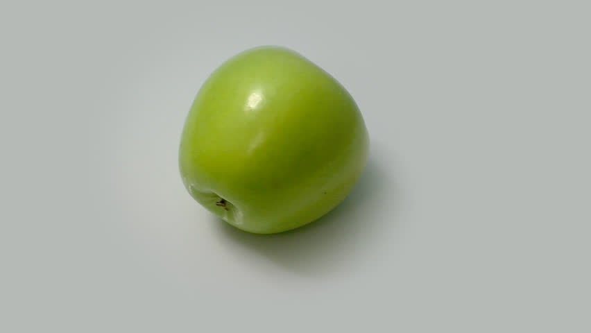 rotating green apple