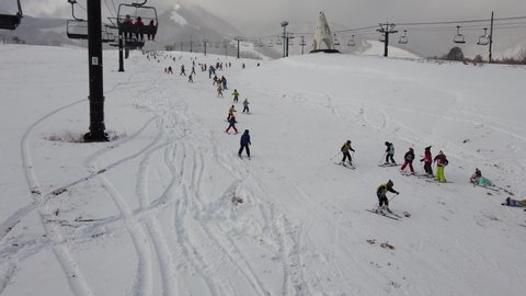 Hakuba, Japan - January 1,2020 : Many people enjoy skiing at Tsugaike Kogen Ski Resort in Hakuba, Japan on January 1,2020.