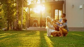Smiling Father, Mother and Son Pet and Play with Smooth Jack Russell Retriever Dog. Sun Shines on Idyllic Happy Family with Loyal Pedigree Dog have Fun at the Idyllic Suburban House Backyard - Powered by Shutterstock - Get 15% off with code: PIKWIZARD15