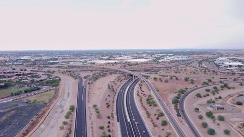 Aerial footage of Interstate 10 and 202 interchange at Chandler,Ahwatukee Foothills area of Phoenix, Arizona, USA 