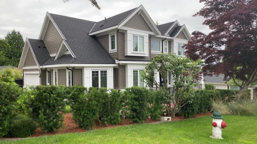 Houses in suburb at Summer in the north America. Luxury houses with nice landscape.