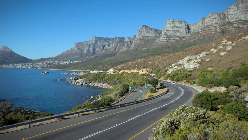 time-lapse, cars drive in front of 12 Apostles in Cape Town, South Africa.