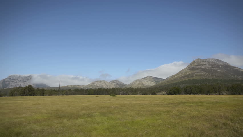 time-lapse, clouds move over the Tsitsikamma Mountains in South Africa.