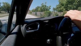 Driving modern car through the settlement 4K video