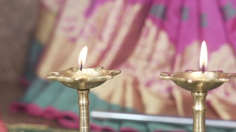 Close-up of Deepak or Diya also known as Brass Oil Lamp. This Candle Flame Lamp used for worshiping god. and in every Religious Traditions of Hinduism.