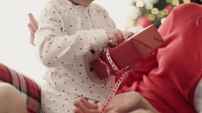 Video of little girl unpacking present on Christmas morning.  Shot with RED helium camera in 8K.