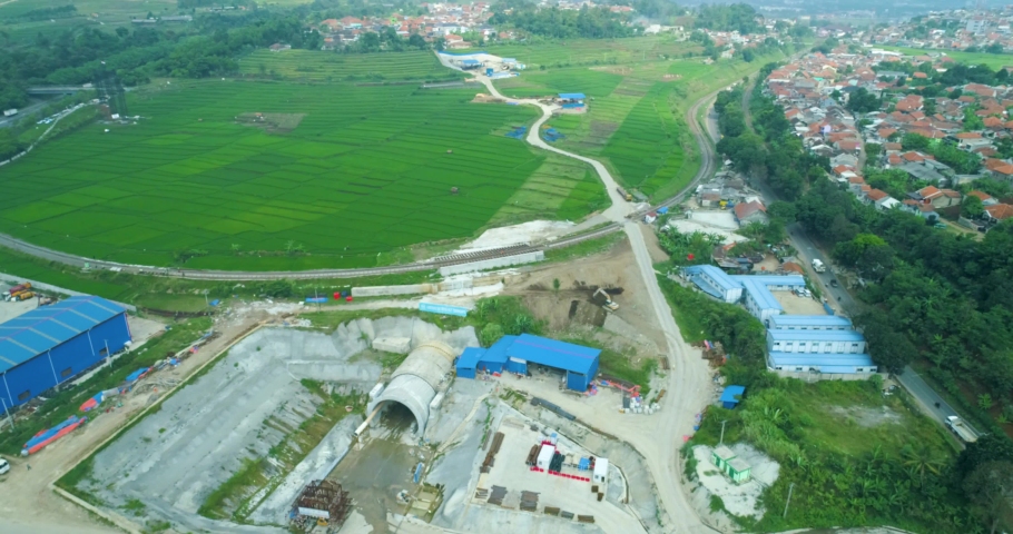 Scenic aerial view of jakarta bandung high speed train tunnel 10 inlet  construction project near cimeta bridge and cipularang toll road,  padalarang bandung, indonesia