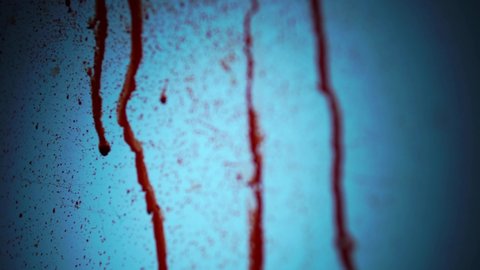 CSI Photograph Blood Splatter Patterns On Wall In Murder Crime Scene. Filmed Using Film Blood.