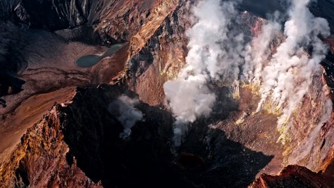 Smoking active crater of Mutnovsky volcano.