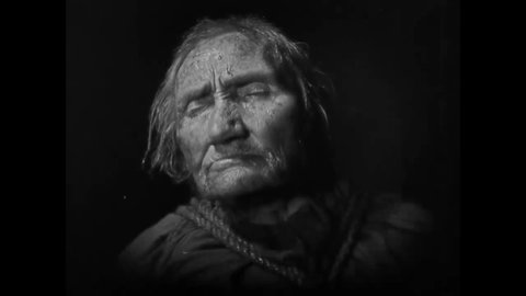 CIRCA 1922 - In this horror film, medieval priests torture an old woman accused of witchcraft intending to get a confession.