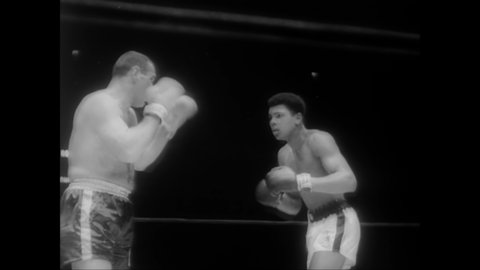 CIRCA 1960 - Heavyweight newcomer Cassius Clay defeats Gary Jawish at the intercity Golden Gloves championship held at Madison Square Garden.