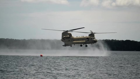 CIRCA 2020 - Florida National Guard soldiers Helo-Cast in Kingsley Lake from a CH-47 Chinook helicopter at Camp Blanding.
