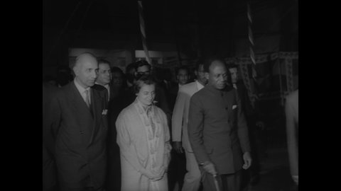 CIRCA 1966 - Prime Minister Nkrumah of Ghana is welcomed to India by Indira Gandhi, unaware that a military coup is planning to overthrow him.