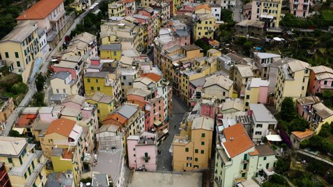 Aerial fly over streets of Riomaggiore, Cinque Terre Italy