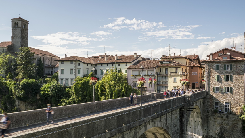 Cividale del Friuli, Italy. 23 August 2020.A time-lapse view of  the bridge over the Natisone river, also called the "Devil's bridge" | Shutterstock HD Video #1058384179