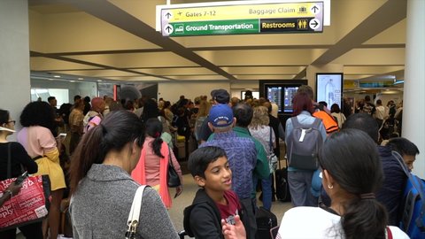 NEW YORK CITY - JULY 19: Passengers waiting for boarding at JFK Airport July, 2019 in New York, NY. It is the busiest international air passenger gateway in the United States.