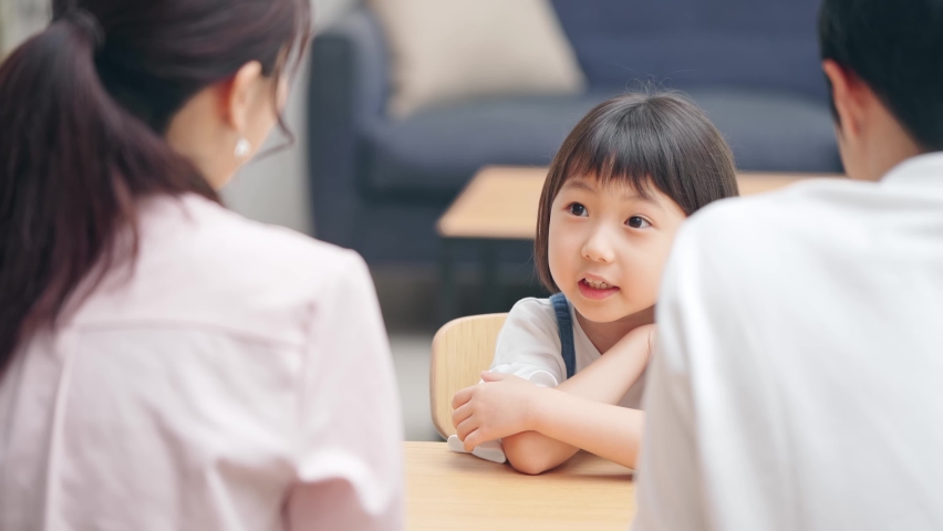 Family talking in modern interior.