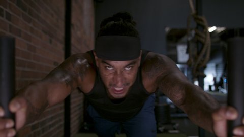 Push through the pain. A diverse athlete uses power to move the immovable.  Maximum focus and strength. Shot in 4k.  