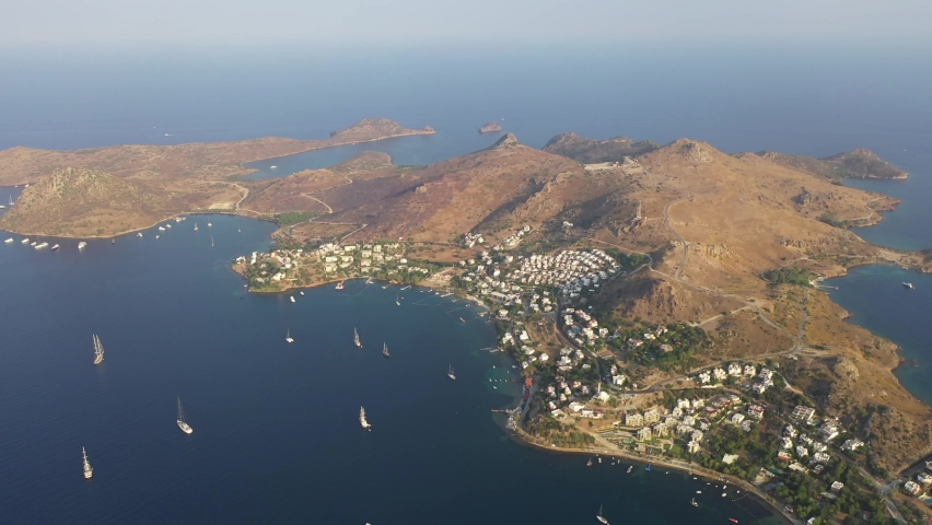 Yalıkavak is a town on Turkey’s Bodrum Peninsula, on the Aegean Sea. It’s known for its marina and beaches, including Yalıkavak Beach, just off Beach Road in the center of town.