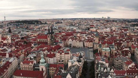 Aerial footage of Old Town Square in Prague, Czech Republic on cloudy morning 4K