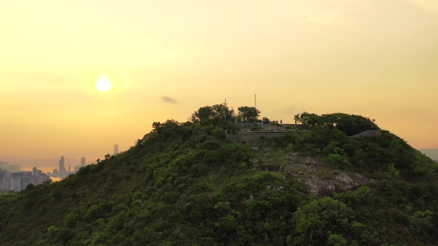 Aerial view of a peak near Yau Tong area, East of Hong Kong, evening, outdoor Royalty-Free Stock Footage #1058450365