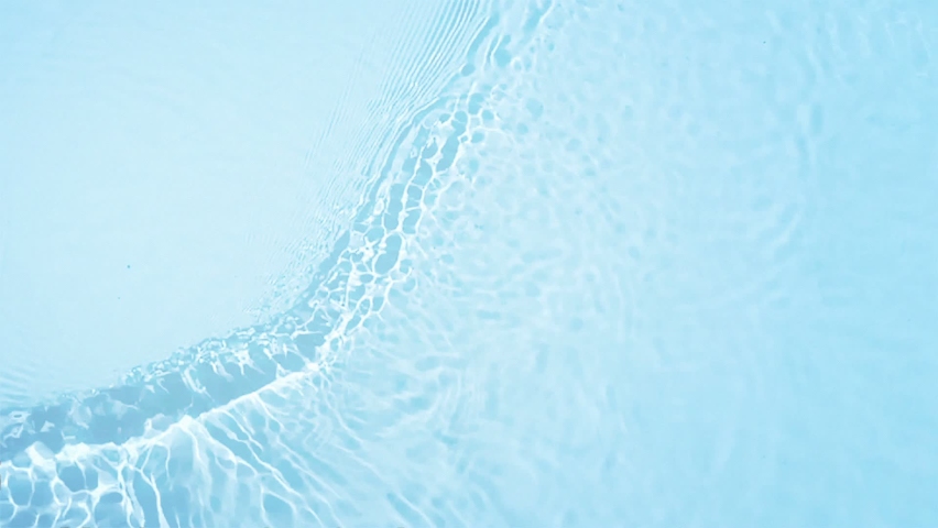 Beautiful Water Surface Flowing in slow motion. Clear Blue Water Caustic Background, Top view of Water on white background. Refraction of sunlight top view water texture  | Shutterstock HD Video #1058460217
