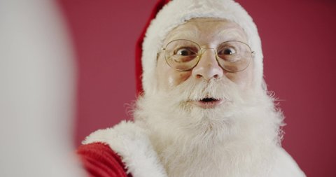 Santa Claus making selfie photos. Christmas night. Gift delivery. Enchanted dreams of children. Video conference. 4K.