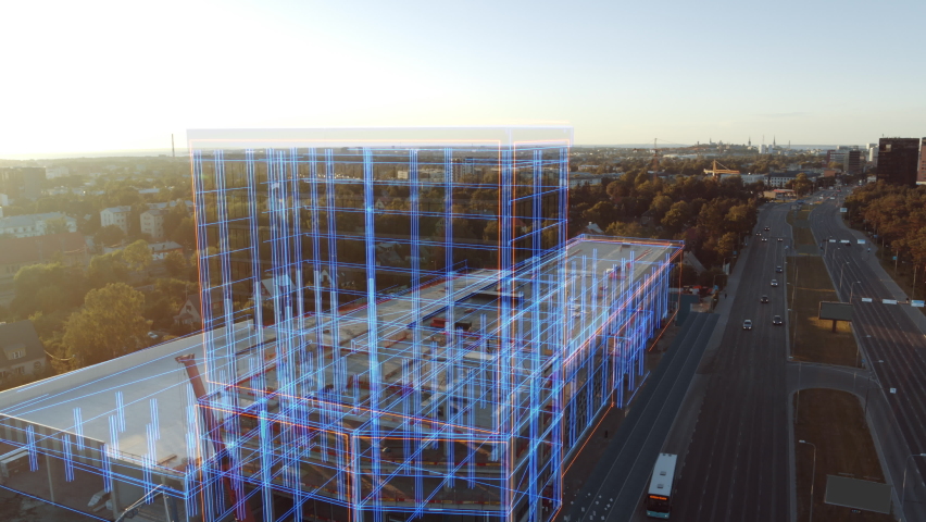 Aerial Drone Footage with VFX Concept: Building Construction Site Becomes Finished Project with 3D Graphics Animation Effects. Visualization, Digitalization of Design, Development of Futuristic City Royalty-Free Stock Footage #1058475700