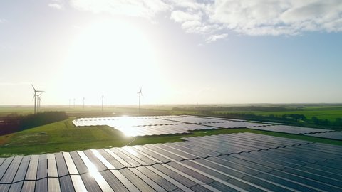 Solar power station with wind rbines in background / Delfzijl, Groningen, Netherlands,Nare