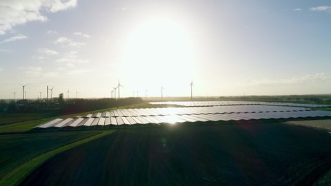 Solar power station with wind rbines in background / Delfzijl, Groningen, Netherlands,Nare