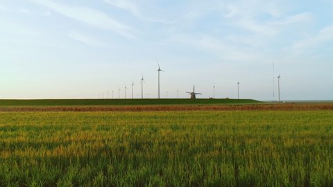 Historical windmill Goliath near wind rbines in Eemshaven harbor area / Delfzijl, Groningen, Netherlands,Nare