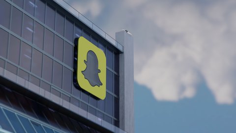 SNAPCHAT, USA - AUGUST 2019: 3D CGI Hyperlapse Animation of Snapchat Corporate Building During Cloudy Day. Snapchat is a multimedia messaging app used globally since 2011.