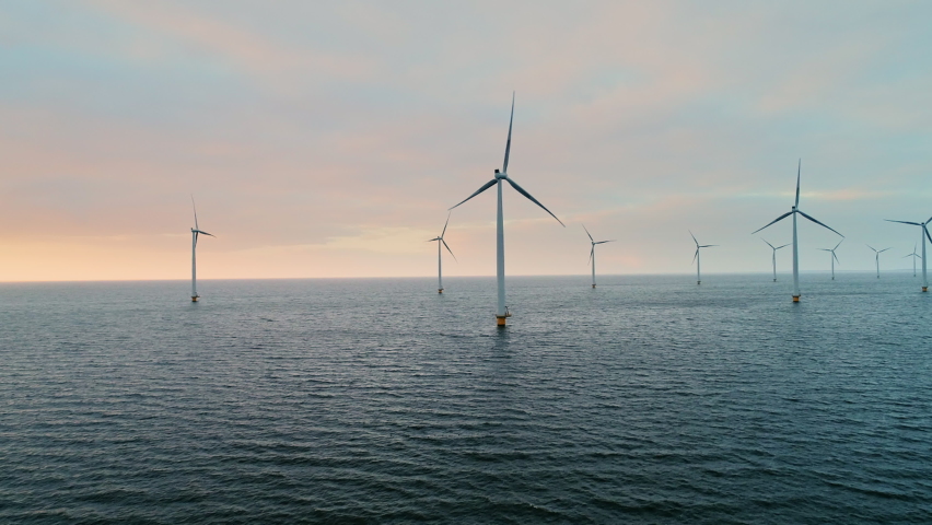 Wind turbines in sea and on land / Urk, Flevoland, Netherlands | Shutterstock HD Video #1058484163