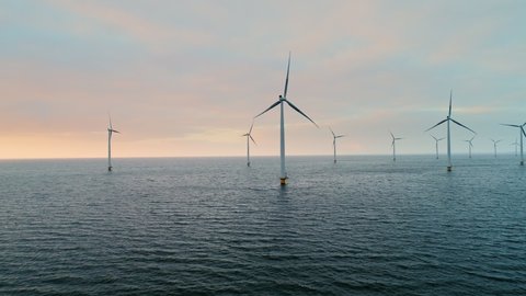 Wind turbines in sea and on land / Urk, Flevoland, Netherlands