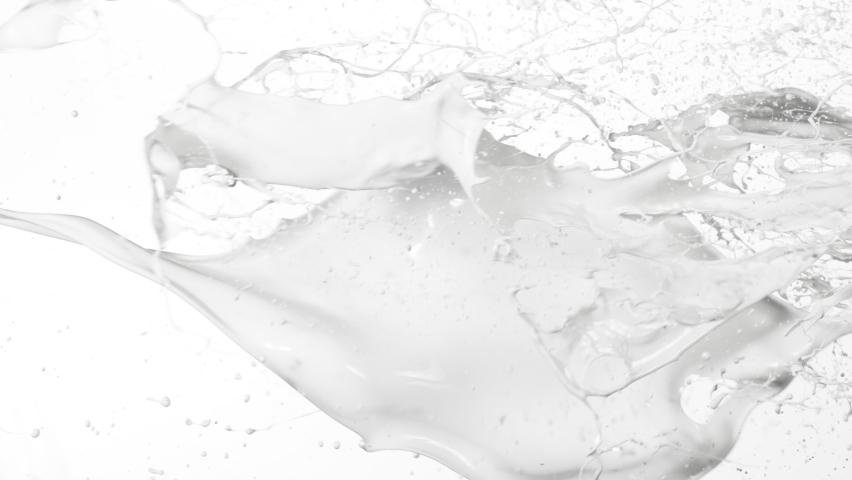 Super slow motion of flying milk splashes on white background. Filmed on high speed cinema camera, 1000 fps. | Shutterstock HD Video #1058485441